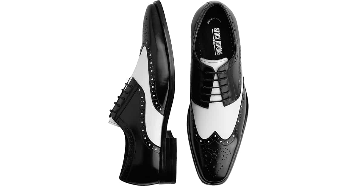 black and white wing tip shoes
