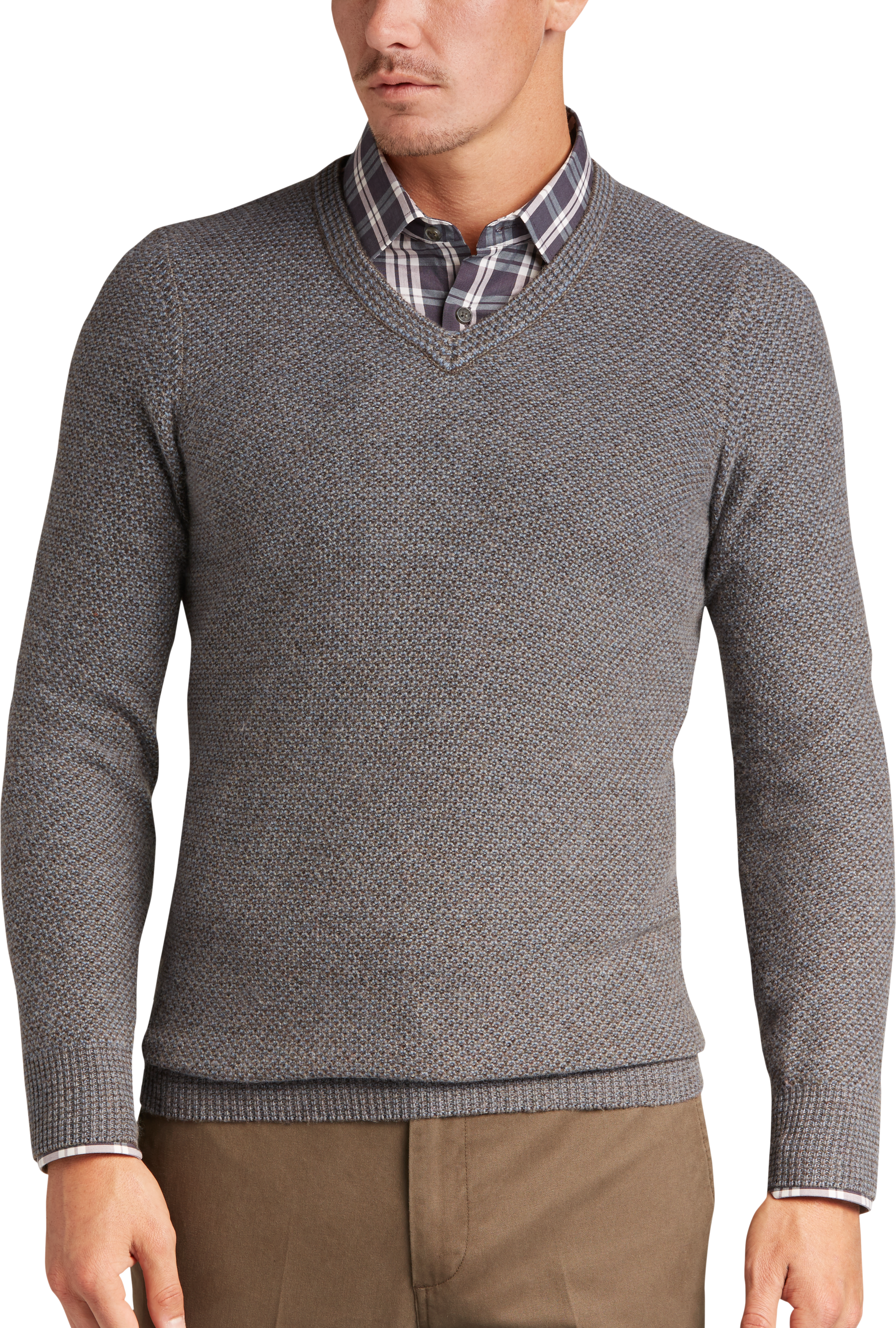 brown sweater blue shirt