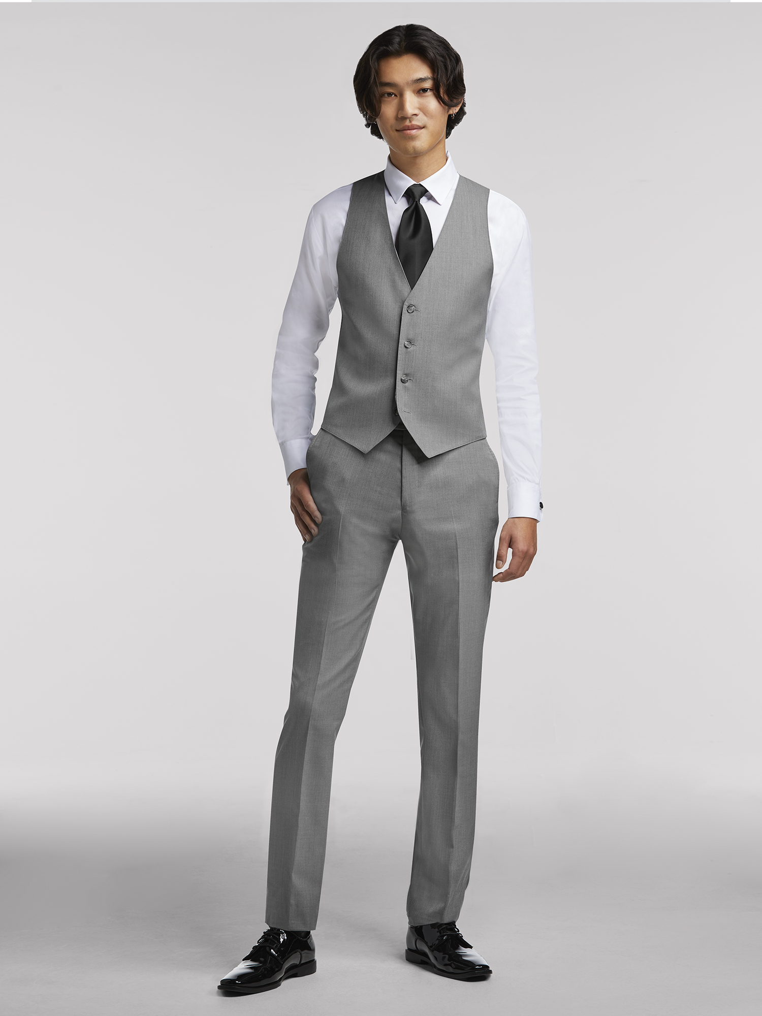 10 Dapper Grey Suits You'll Fall In Love With  Light grey suit men, Grey  suit men, Black suit men